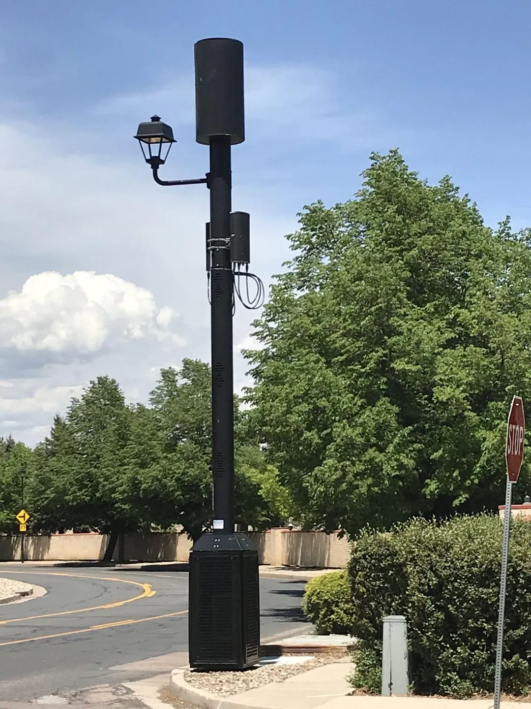 A street light on the side of a road.